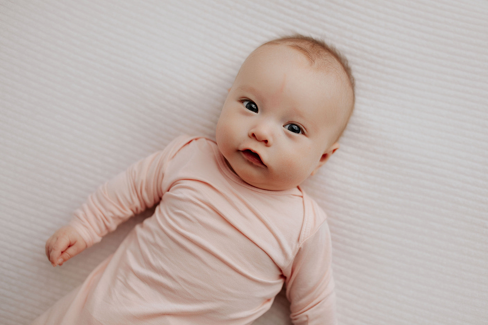Trust in our modal knotted baby gowns, providing unparalleled comfort and ease for your newborn baby's delicate skin.