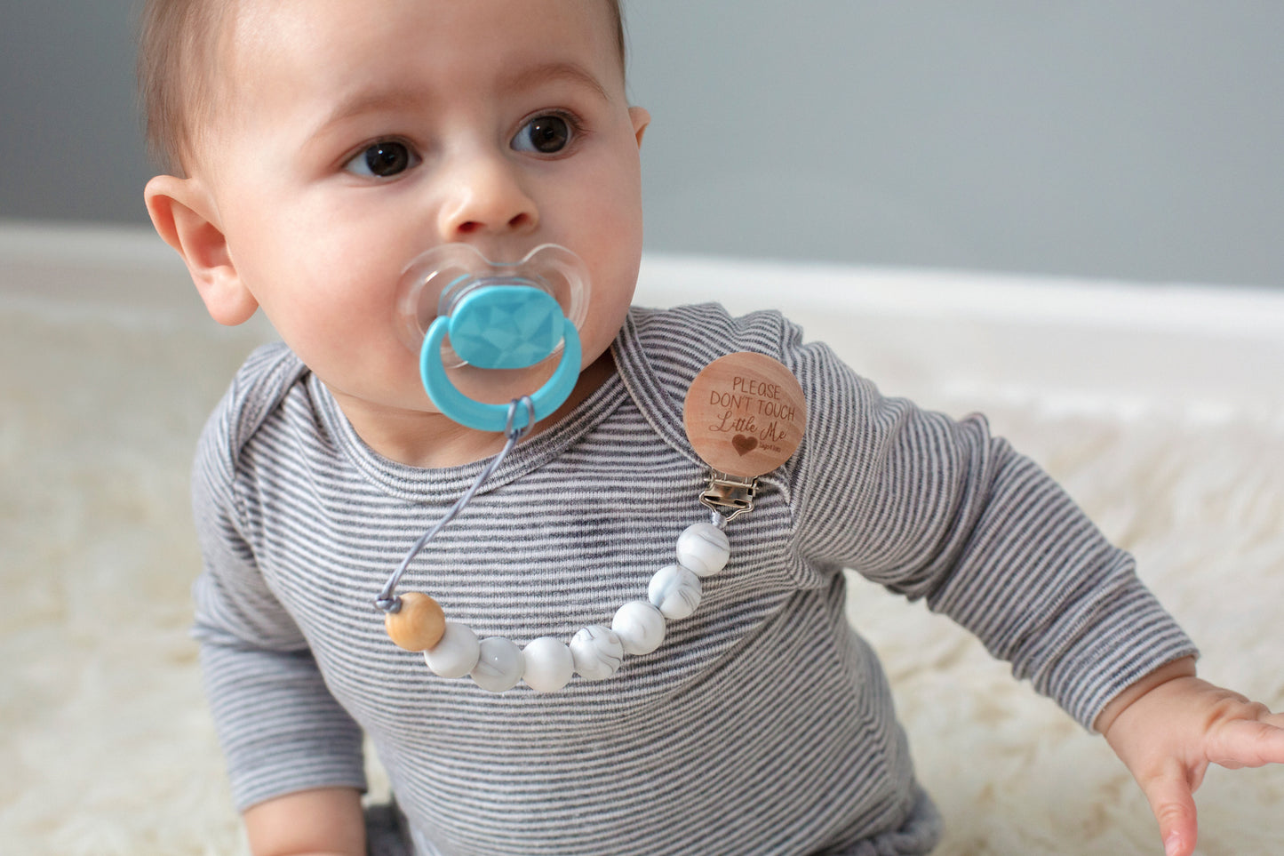 CPSIA certified silicone pacifier clips, handmade in Mount Vernon, IN. Safe for your Disney trip and beyond.