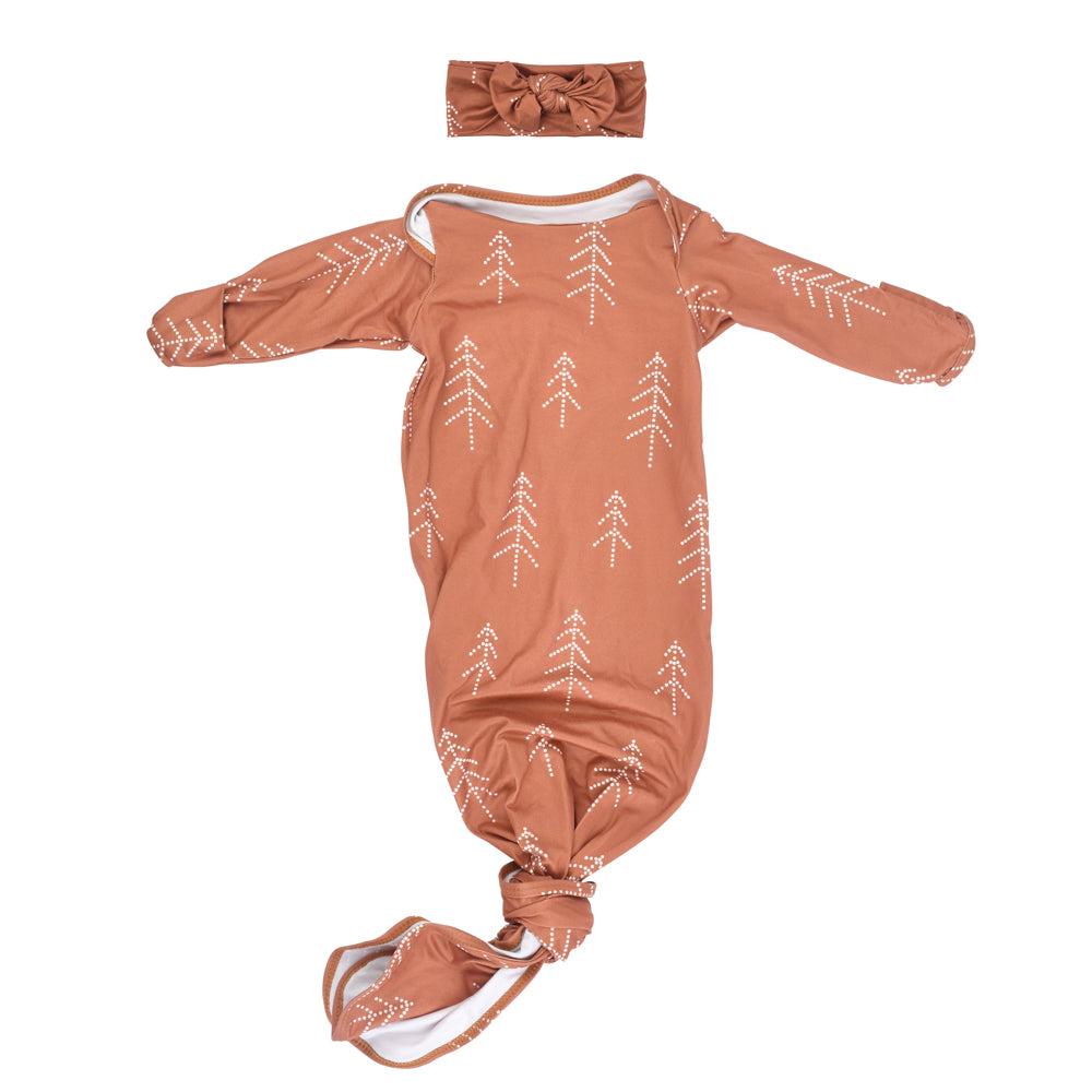 Super soft Christmas-themed baby gowns with stretchy fabric and easy-access tie bottom for quick diaper changes.