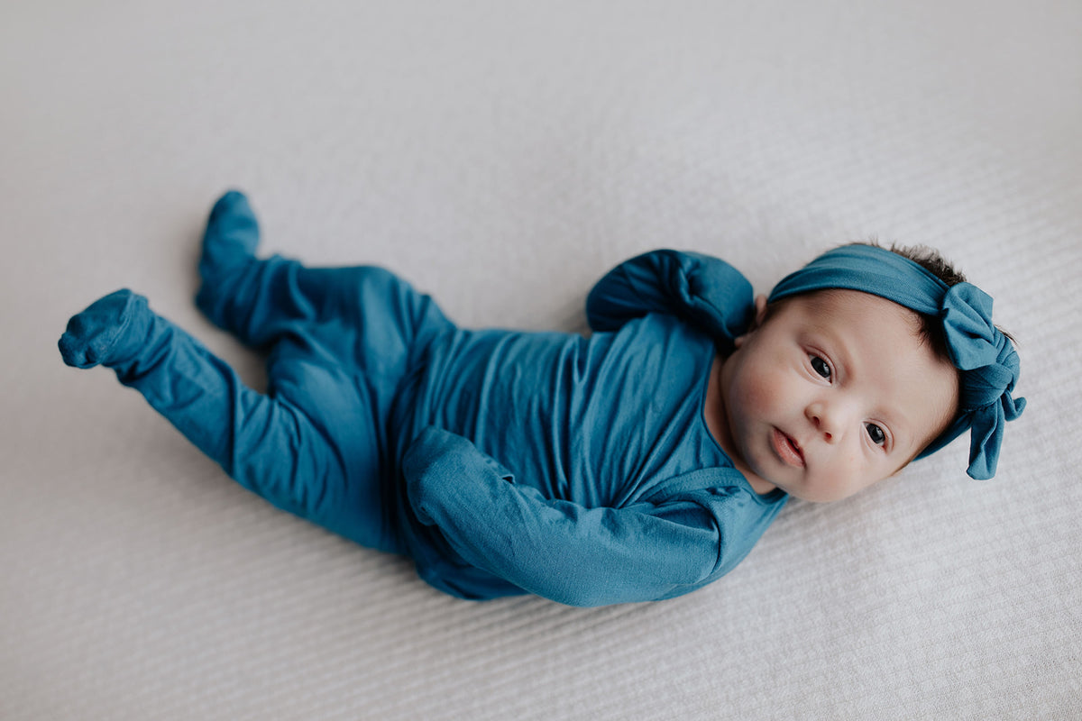 Newborn Jammies with buttery-soft fabric, fold-over mittens, footies for ultimate comfort and all-day coziness.