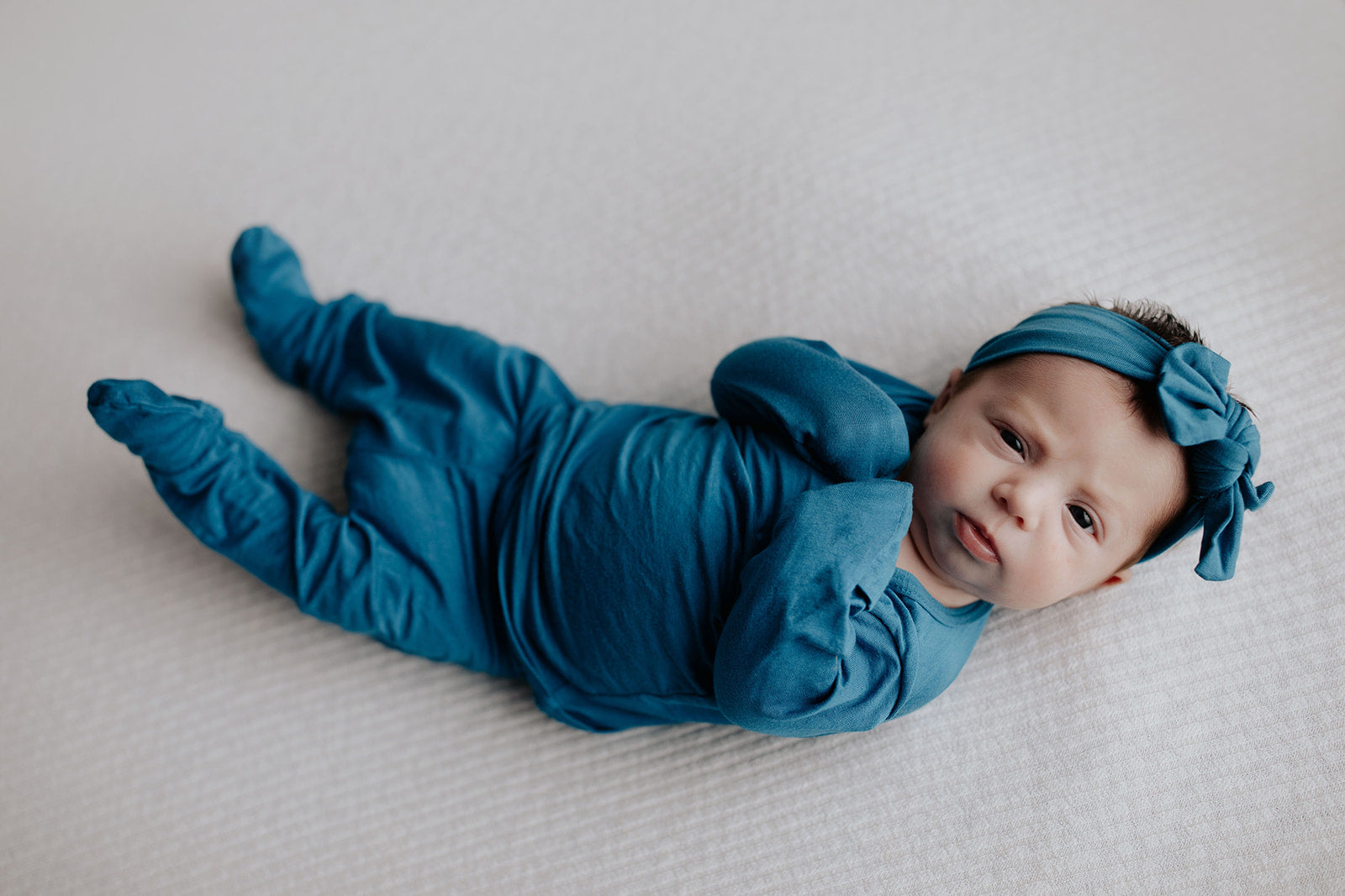 Newborn Jammies with buttery-soft fabric, fold-over mittens, footies for ultimate comfort and all-day coziness.