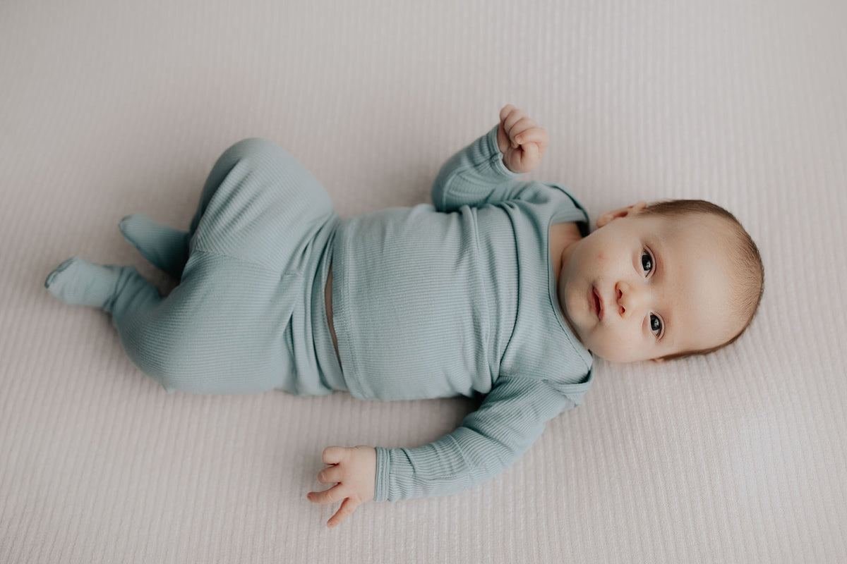 Newborn Jammies with buttery-soft fabric, fold-over mittens, footies for ultimate comfort and all-day coziness.