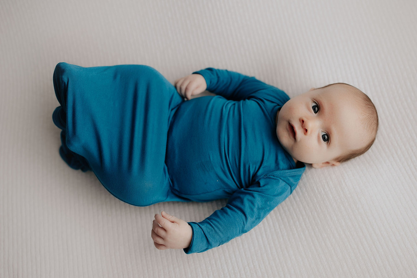 Handpicked fabric blend ensures soft, stretchy baby gowns that simplify night-time changes and dressing.