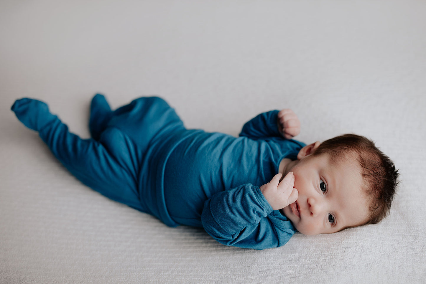 Newborn Jammies with buttery-soft fabric, fold-over mittens, footies for ultimate comfort and all-day coziness.