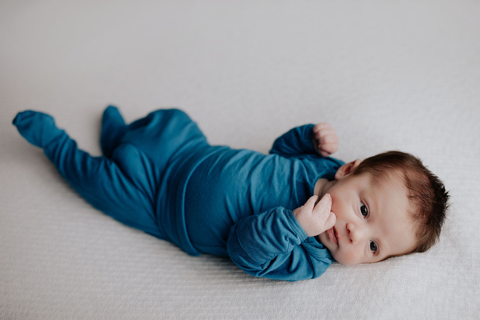 Newborn Jammies with buttery-soft fabric, fold-over mittens, footies for ultimate comfort and all-day coziness.
