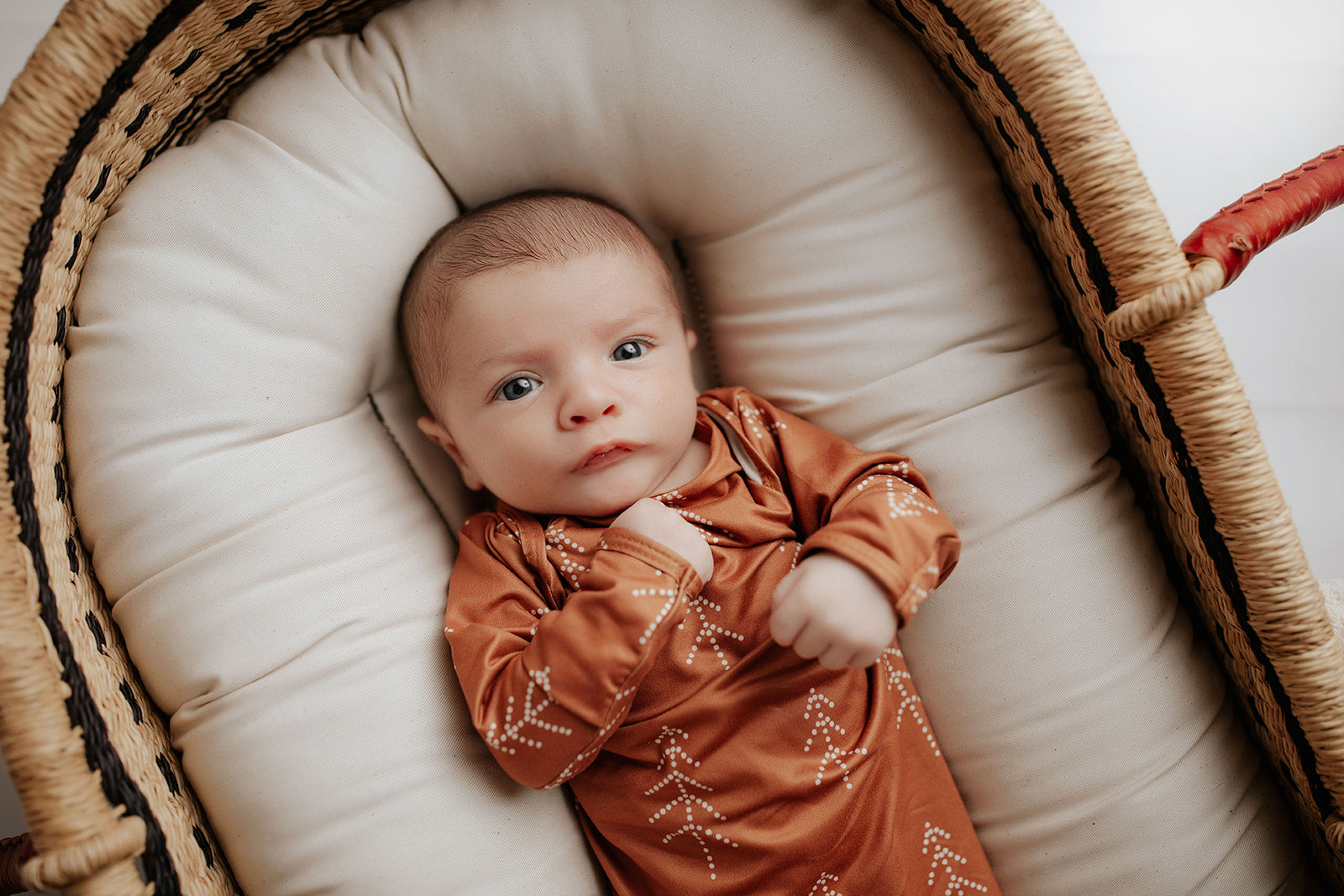 Super soft Christmas-themed baby gowns with stretchy fabric and easy-access tie bottom for quick diaper changes.