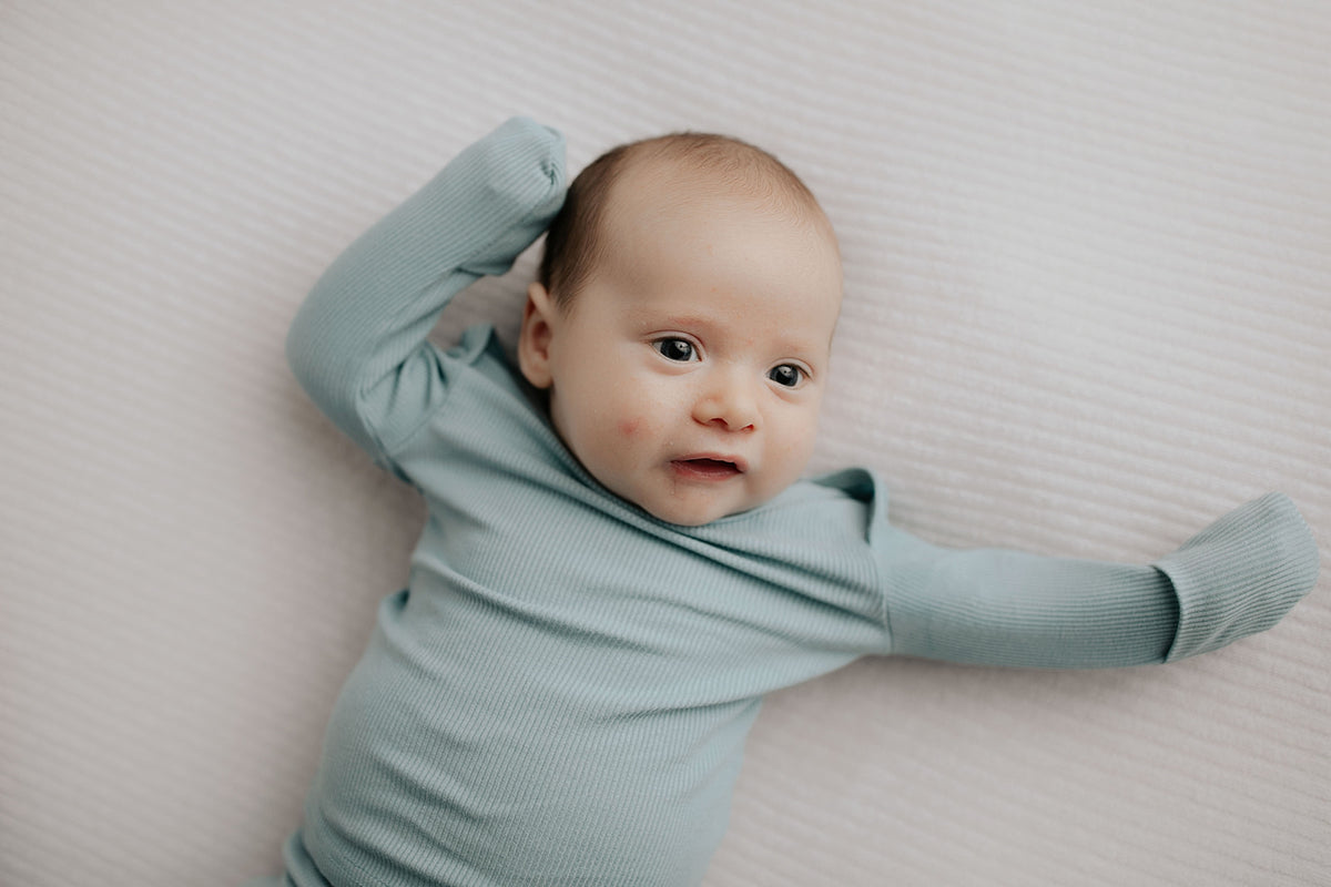 Newborn Jammies with buttery-soft fabric, fold-over mittens, footies for ultimate comfort and all-day coziness.