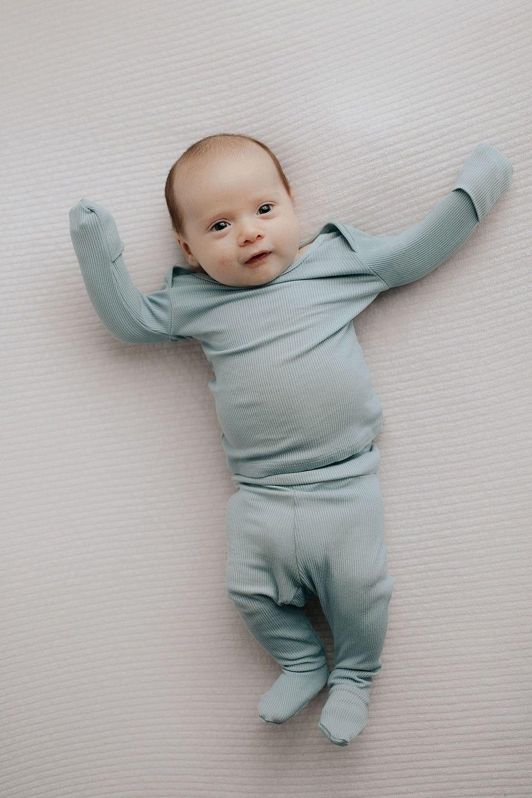 Newborn Jammies with buttery-soft fabric, fold-over mittens, footies for ultimate comfort and all-day coziness.