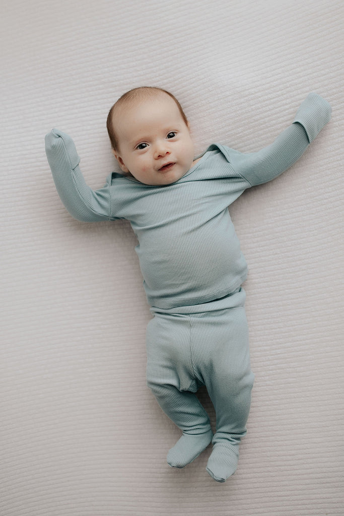 Newborn Jammies with buttery-soft fabric, fold-over mittens, footies for ultimate comfort and all-day coziness.
