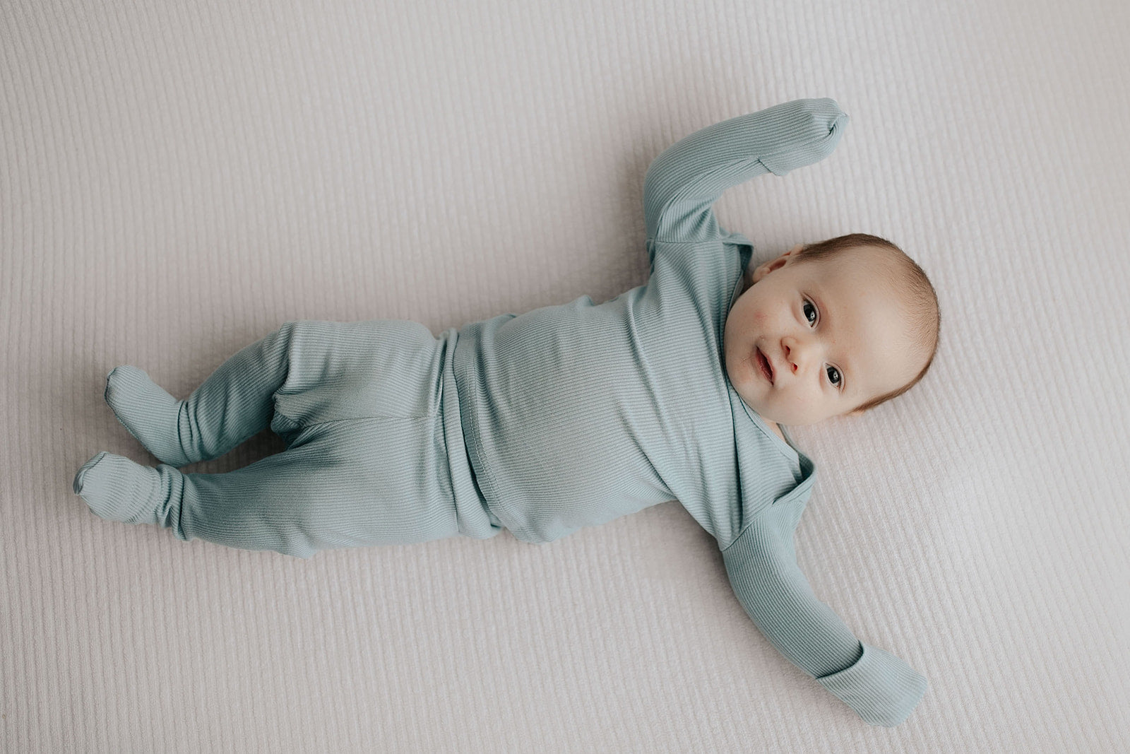 Newborn soft modal pajamas with fold over mittens and footies