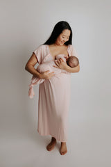 mom breastfeeding easily in the Three Little Tots labor and delivery gowns