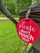 Three Little Tots Pink No Touching Sign on a stroller