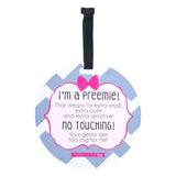 A sign for a newborn's car seat for premature babies that is a friendly reminder to look and not touch the baby
