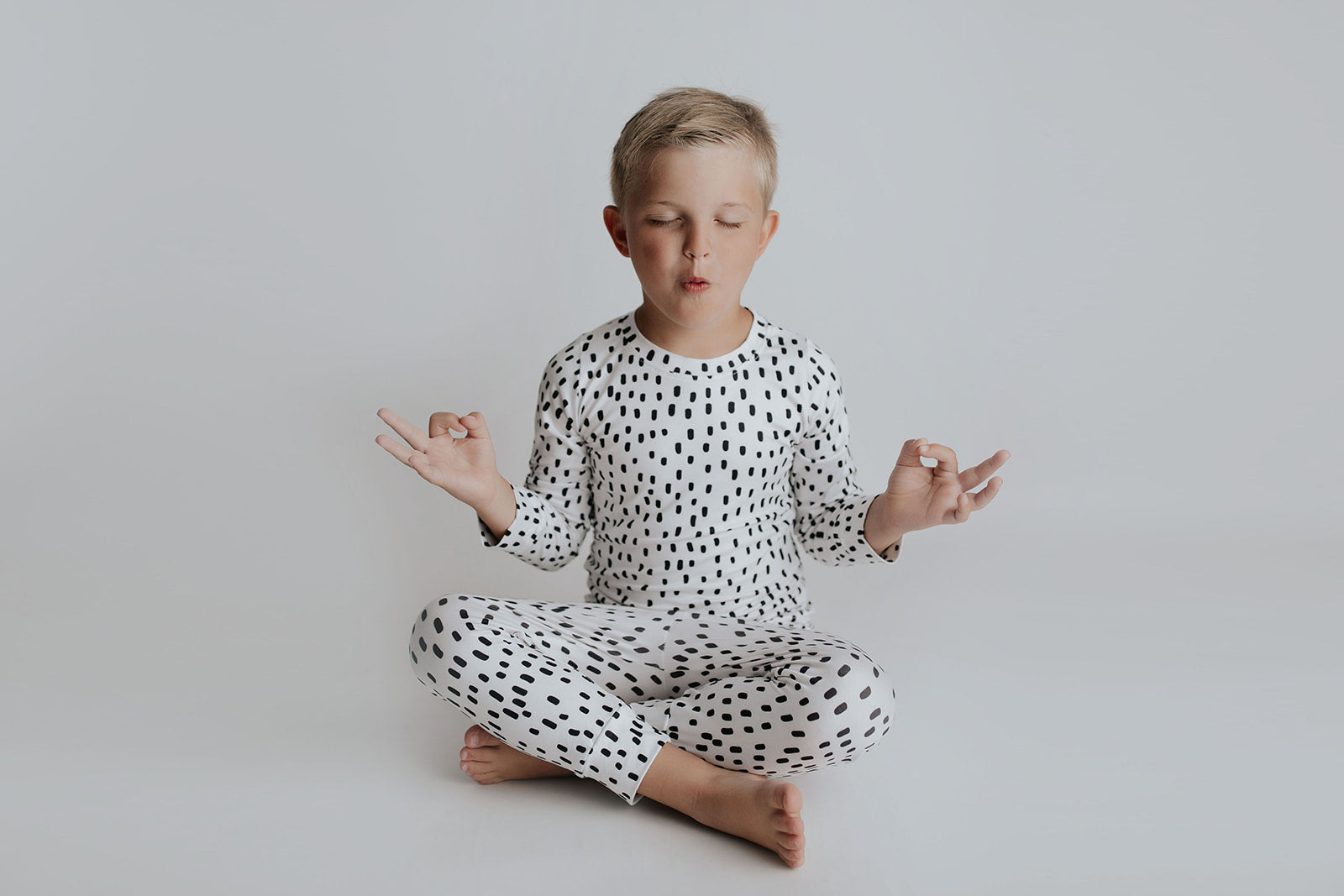 Polka Dot Toddler and big kid jammies in matching prints and solids, designed for comfy bedtime or lounging all day.