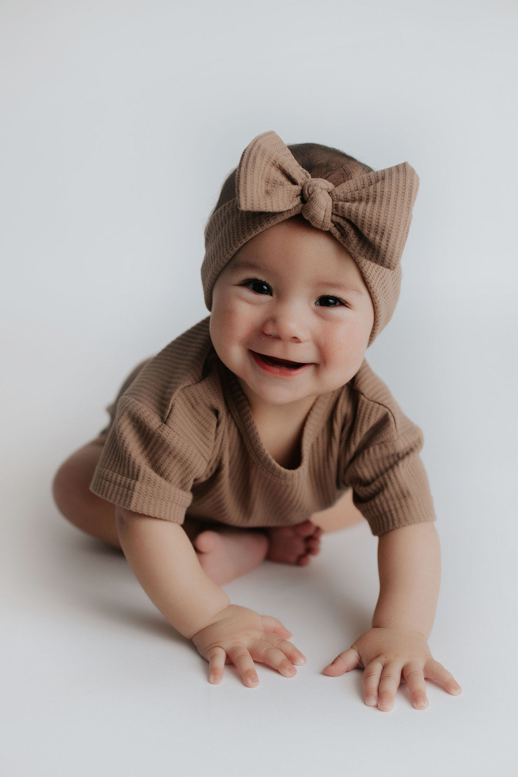 Buttery soft and stretchy knotted headbands, hand-tied for your little girl's comfort and adorable style.