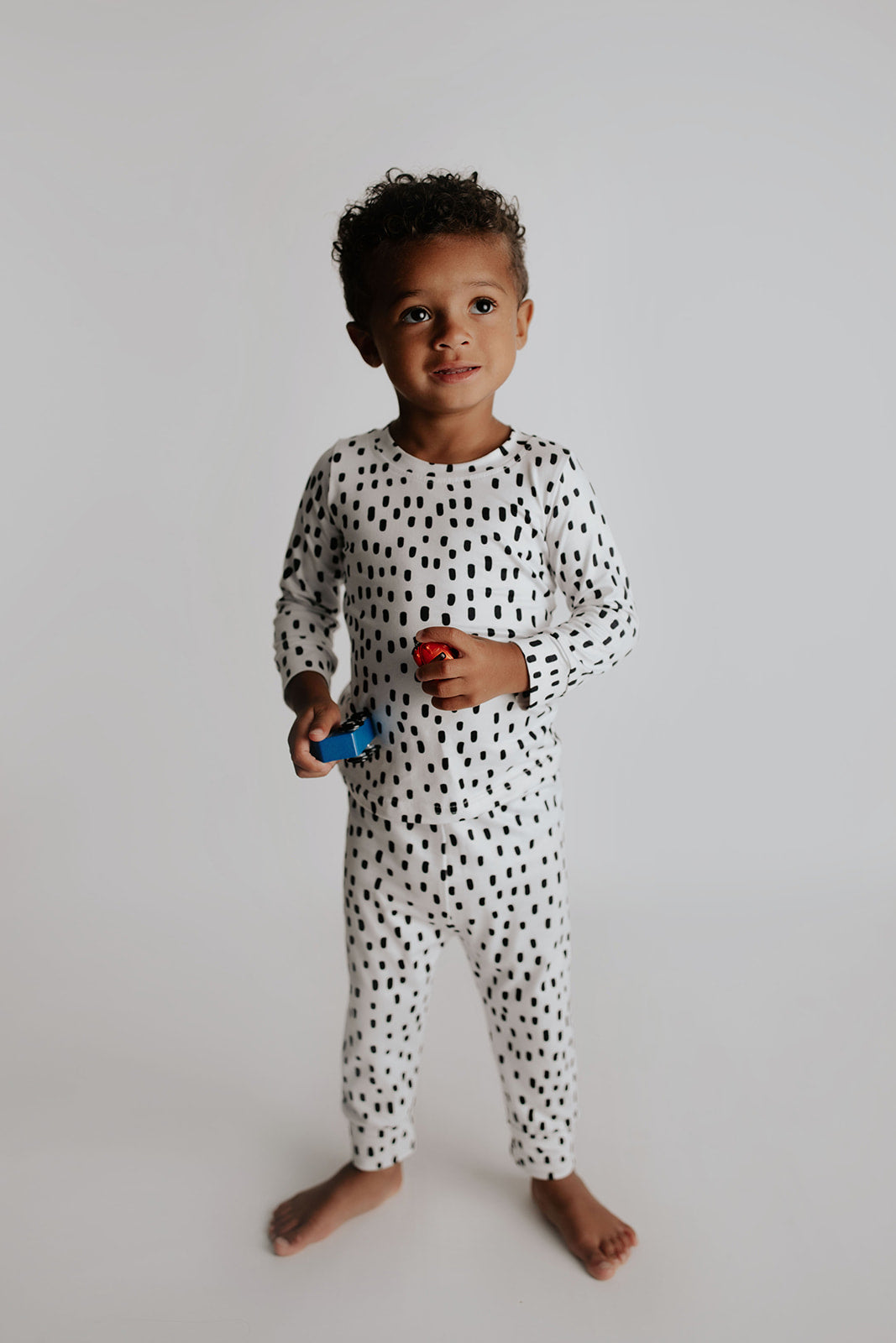 Polka Dot Toddler and big kid jammies in matching prints and solids, designed for comfy bedtime or lounging all day.