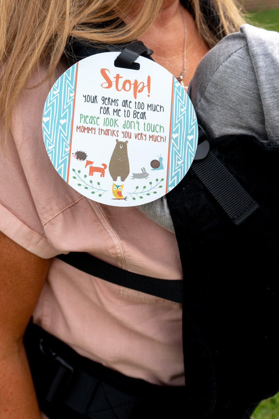 Three Little Tots Woodlands Car Seat sign on a baby carrier